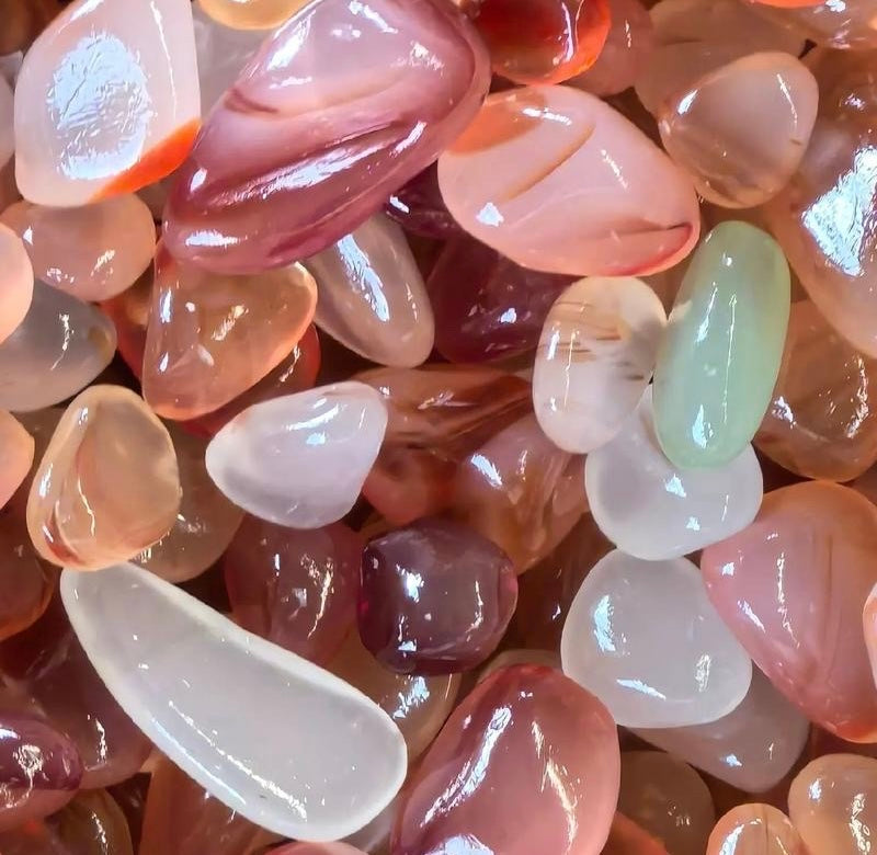 Colorful assortment of polished crystals representing Discover Your Energy A Guide to Crystal Vibrations.