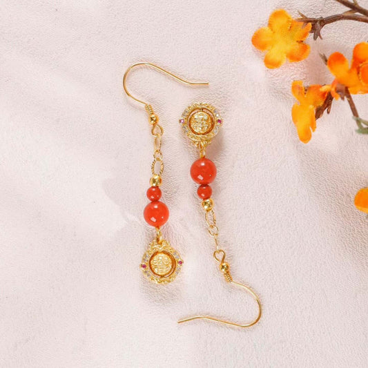 Cinnabar Mahakala Earrings front view 1