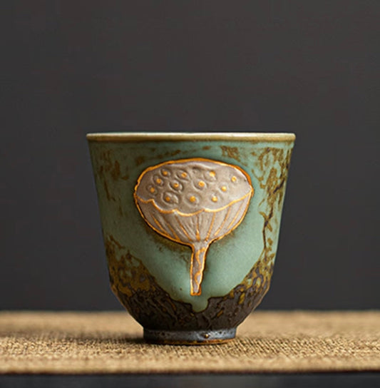 Lotus Seed Sanctuary - A gilded flametouched clay relic reborn in Flametouched Clay BodhiBloom