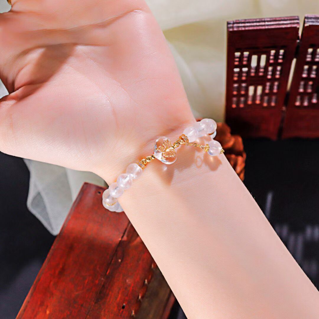 Luminous Wings: Pure Clear Quartz Butterfly Bracelet