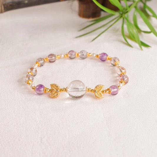 Luminous Aura: Faceted Super Seven, Garnet & Clear Quartz Goldfish Bracelet BodhiBloom